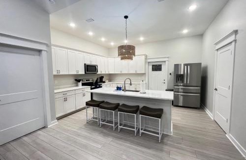 Port St. Joe Villa | Emerald Coast Retreat 2 4person golf carts large swim spa included