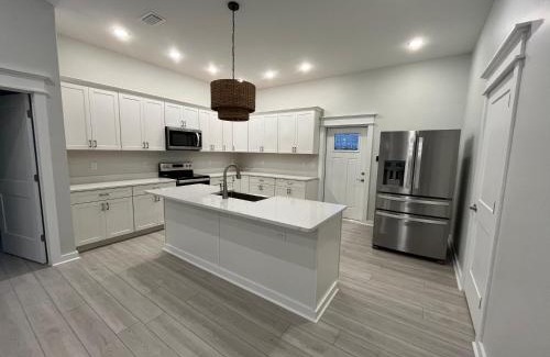 Port St. Joe Villa | Emerald Coast Retreat 2 4person golf carts large swim spa included