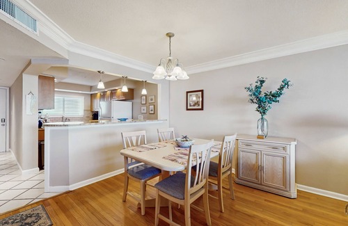 Sand Key Condo | Enchanting beachfront condo with tennis, pool, hot tub, & washer/dryer