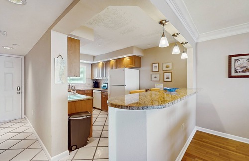Sand Key Condo | Enchanting beachfront condo with tennis, pool, hot tub, & washer/dryer