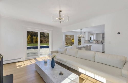 Southold House | Enchanting home with large backyard, stunning pool, expansive patio, and...