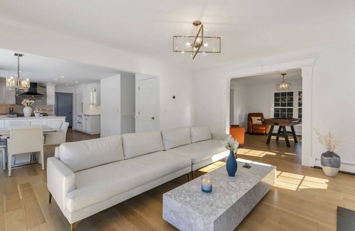 Southold House | Enchanting home with large backyard, stunning pool, expansive patio, and...