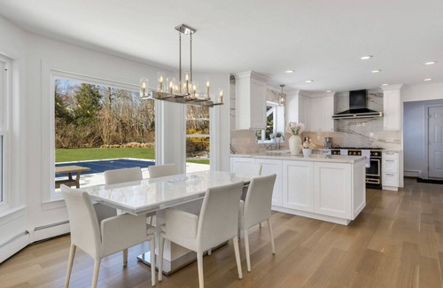 Southold House | Enchanting home with large backyard, stunning pool, expansive patio, and...