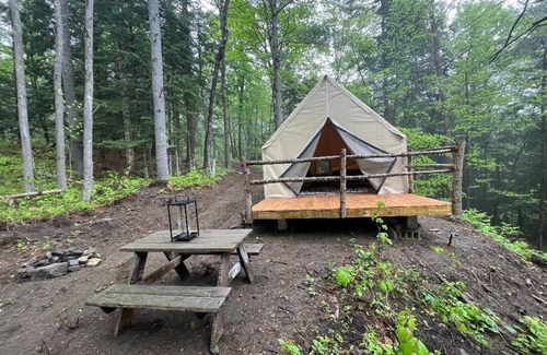 St. Johnsbury RV Rental | Enchanting Off=Grid Glamping Tent @ Dagger's Ravine