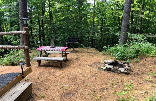St. Johnsbury RV Rental | Enchanting Off=Grid Glamping Tent @ Dagger's Ravine