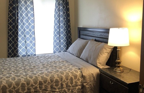 Maple Heights Apartment | English Tudor Apartment with Assigned Covered Parking