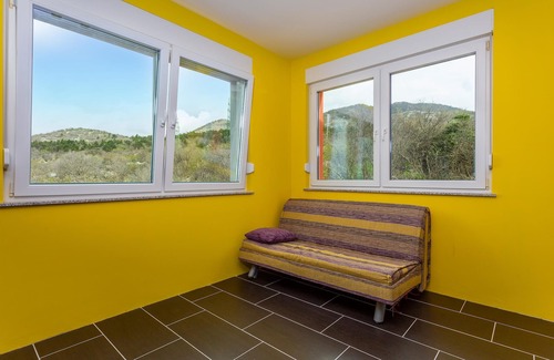 Hreljin Apartment | Enjoy a beautiful view of the sea in this vacation apartment with whirlpool.