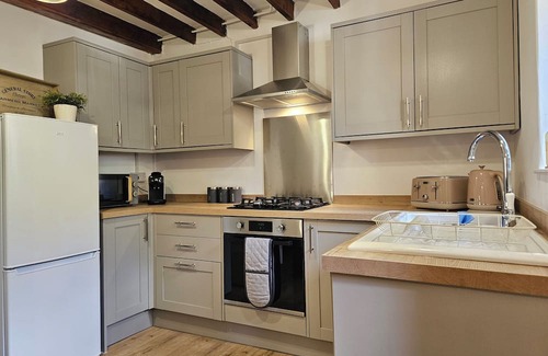 Oakworth House | Enjoy a comfortable stay at The Old Shuttleworks. A stylish, modern, home from home by Above Rubies in Oakworth, West Yorkshire. Famous for The Railway Children! Near Haworth and Brontë country!