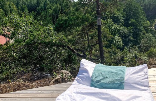 Risor House | Enjoy a wonderful vacation close to nature in this inviting vacation home.