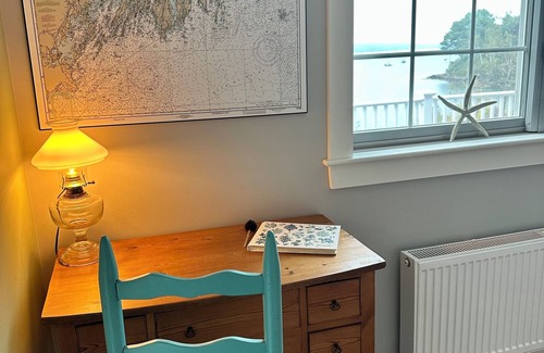 Harpswell House | Enjoy coffee & sunrise on the fabulous waterfront porch at a Harpswell retreat!