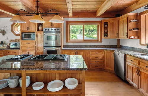 Lower Village House | Enjoy fall foliage from the hot tub!