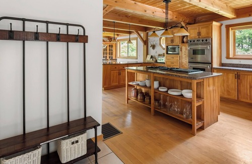 Lower Village House | Enjoy fall foliage from the hot tub!