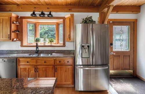 Lower Village House | Enjoy fall foliage from the hot tub!