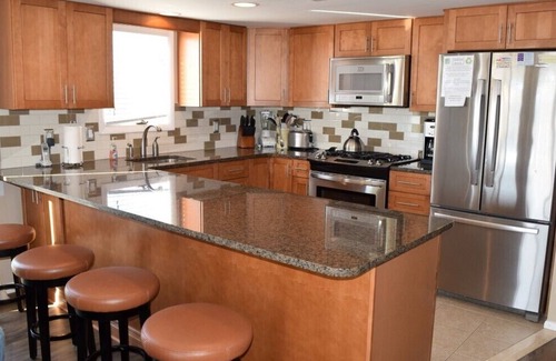 Dennisville Condo | Enjoy spectacular sunrises and sunsets from the large ocean & bay decks.