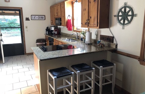 Blairsville House | Enjoy swimming and boating off our two story dock or relaxing in the hot tub.