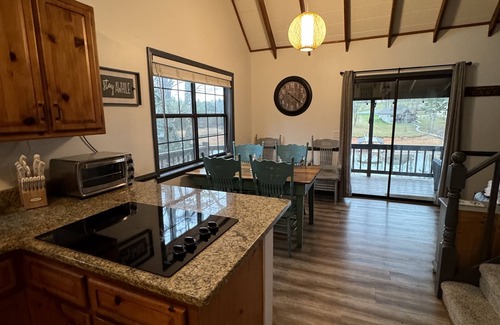 Blairsville House | Enjoy swimming and boating off our two story dock or relaxing in the hot tub.