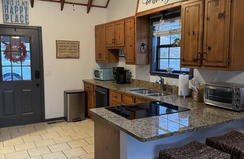 Blairsville House | Enjoy swimming and boating off our two story dock or relaxing in the hot tub.