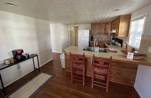 Flat Hollow Marina Cottage | Enjoy the breathtaking views, within walking distance to Flat Hollow Marina!