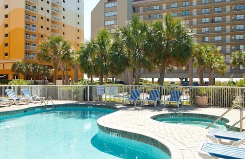 Windy Hill Condo | Enjoy the resort amenities (lazyriver) with the family in great beach 2BD condo