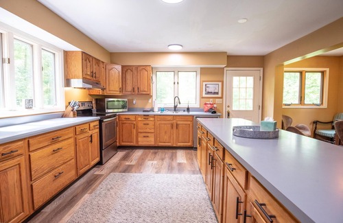 Helmsburg Cabin | Ensconced in natural beauty. The Ridge. Pet Friendly! Game Room!