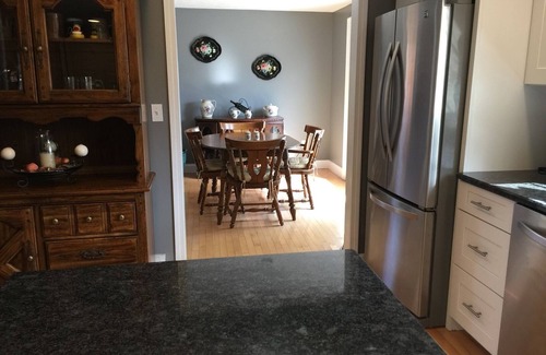 North Deering House | Entire 3 Bedroom House with Large Fenced in Backyard and Hot Tub