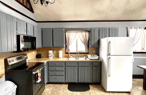 Long Pond Ski Chalet | Entire Cozy Pocono Chalet with fireplace, Firepit BBQ and games