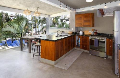 North End House | Entire Tocayo Steps to Beach and Surf 4BD Condo with Master Suite