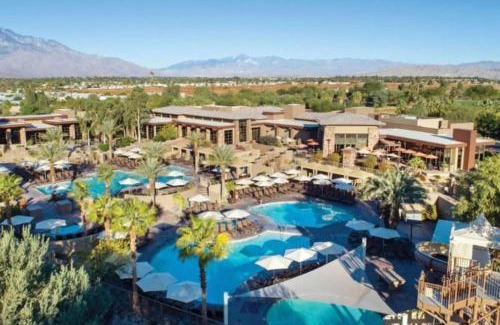 Palm Desert House | Escape the heat of Palm Desert in all the 3 pools with waterslide at this great resort 2BD condo