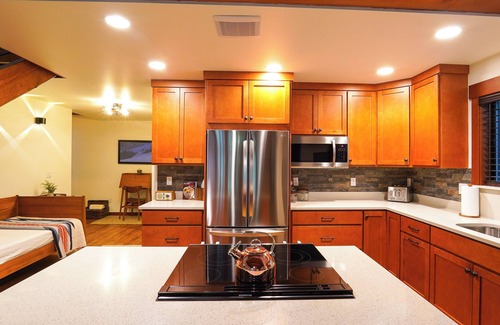Warnick House | Escape to Luxury in the Woods: Hot Tub, EV Charger, & Fireplace!