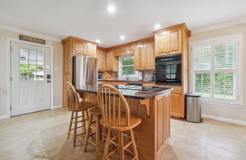 Tate House | Escape to RJ Acres to unwind and relax on 3 acres of privacy.