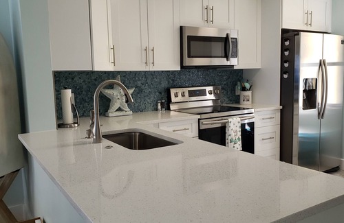 Hutchinson Island South Condo | Escape to your HAPPY place, luxury corner condo right on the beach!