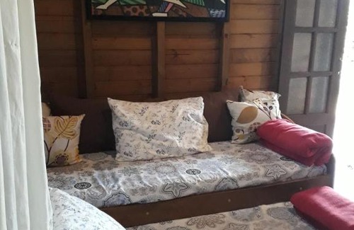 Praia do Rosa Ski Chalet | Essência da Terra - Cabanas de Temporada