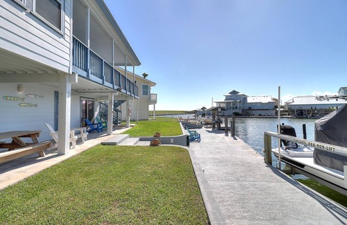 City-by-the Sea House | Estes Oasis! Canal front home with private lighted dock! Views! Foosball game