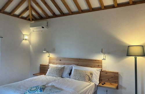 Praia da Vitoria House | Excellent space 5 minutes from the sea and the airport House restored in 2025