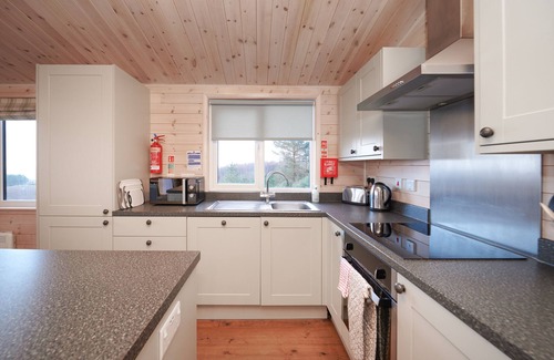 Forres Cabin | Exclusive and stylish with stunning views from your private Hot Tub