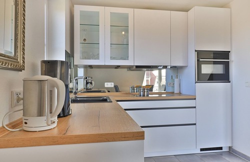 Dassow Apartment | Exclusive apartment Peter Pan in a thatched cottage with sea views, sauna and wireless internet