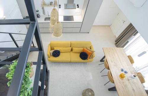 Plaza de Toros Vieja Apartment | Exclusive Central Loft-Style Apartment with 3 Bedrooms, Near Beach and Historic Center