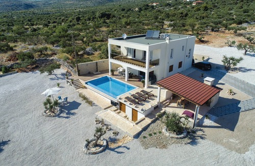 Rogoznica Villa | Exclusive villa for 8 people with heated pool & olive garden with a sea view