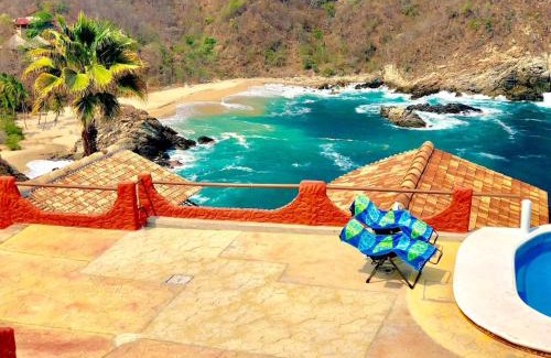 Puerto Angel Villa | Exclusivo Bungalow frente a la playa, alberca nueva con vista infinita al mar, 8 hermosas playas cercanas, terraza con cama de playa y espectacular vista al océano pacífico! Nómadas digitales Starlink WiFi 203 mbps