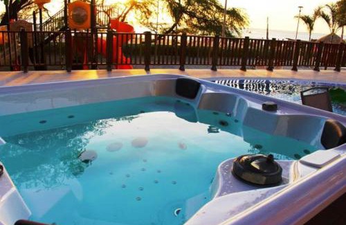 Pozos Colorados Apartment | Exclusivo club de playa con acceso directo a la playa de pozos colorados, cuenta con piscinas olímpicas, para niños, restaurante, jacuzzi, sauna, turco, salón de juegos, simulador de golf, spa, transporte interno, bar, etc.
