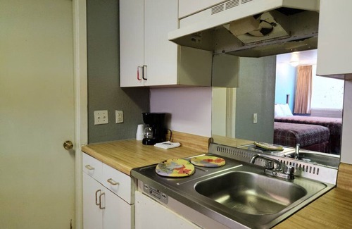 Mena Hotel | Executive Inn By OYO Queenville Mena