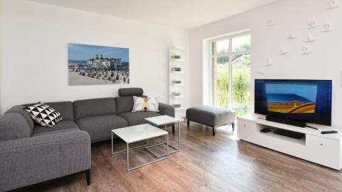 Lobbe House | Exklusive Reetdach-Villa Ostseefrische