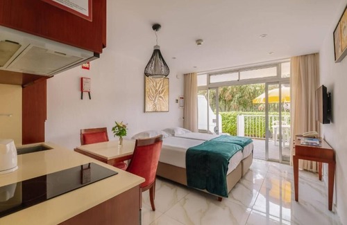 Oura Hotel | Exotic Coastal Retreat! Easy Beach Access on a Terrace Room | 3 Units