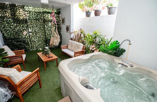 Bucana House | Expansive Paradise with Private Jacuzzi and Tropical Patio