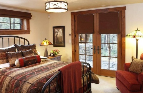 East Kootenay Cabin | Expansive porch with outdoor fireplace! Rec room inc pool and snooker tables