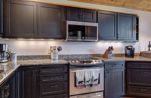 Mirror Lake House | Expansive screened deck, Gas fireplace, Gorgeous views, Firepit