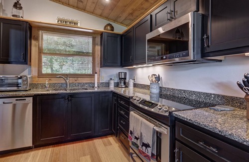 Mirror Lake House | Expansive screened deck, Gas fireplace, Gorgeous views, Firepit
