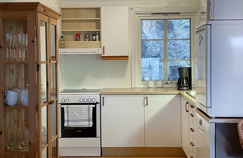 Spangereid House | Experience a real Norwegian vacation atmosphere in this vacation home by the fjord.