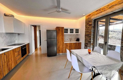 Pisses Apartment | Experience Authentic Charm at Tzia Stone Apt with a Modern Twist and Sea Views