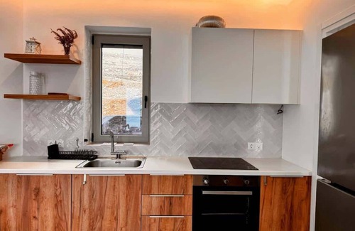 Pisses Apartment | Experience Authentic Charm at Tzia Stone Apt with a Modern Twist and Sea Views